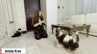 7. 0:20 / Aniela plays with her dog